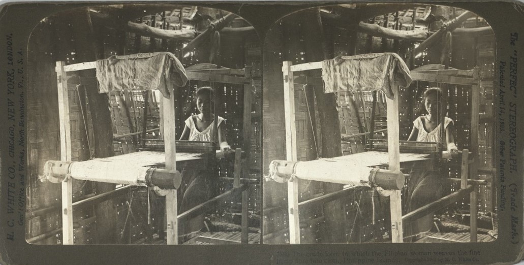 The crude loom in which the Filipino woman weave the fine hemp fibre into cloth.